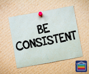 Photo shows a rectangular piece of paper with the words 'be consistent'
